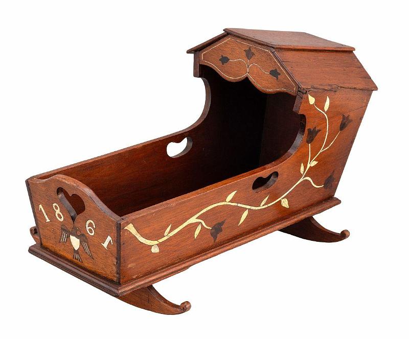 Mahogany Doll Cradle with Whalebone and Rosewood Inlaid Designs and Dated 1861, attributed to Jacob Turnerly. 
