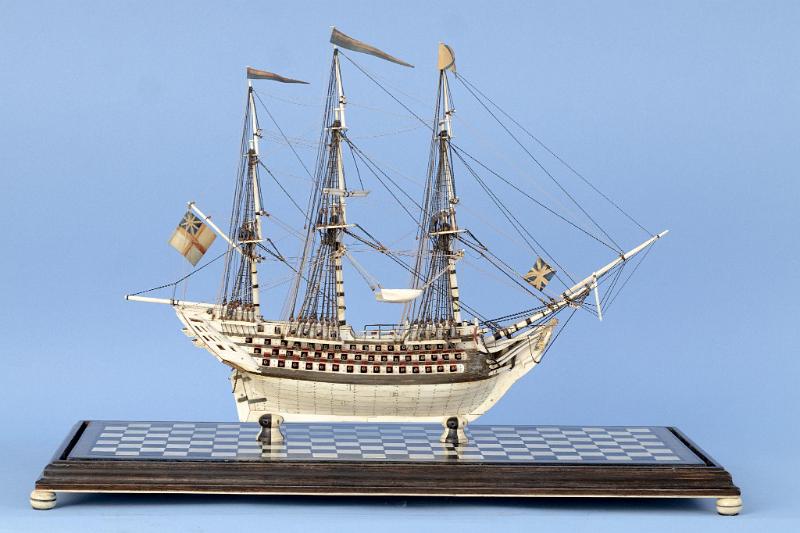 Planked POW Bone model of a British Triple Decker with Baleen Inlay between Cannon