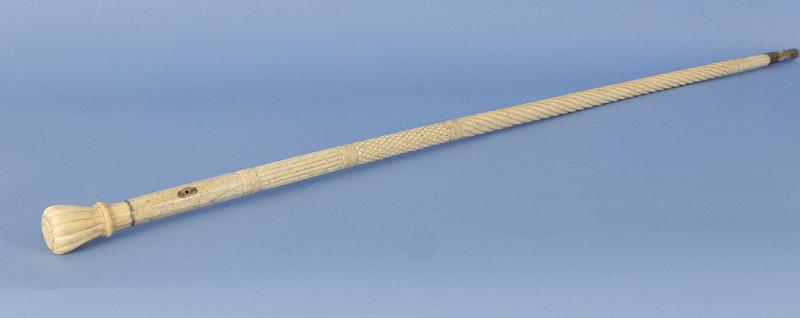 Whale ivory and whale bone carved shaft cane with whale ivory capstan shaped grip and whalebone shaft, circa mid-19th century
