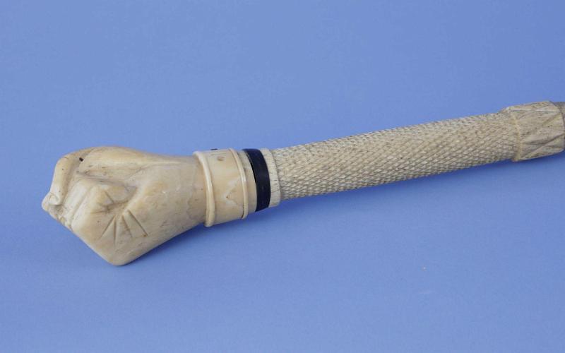 Scrimshaw Whale Ivory and Whale Bone Finely Carved Cane With Fist and Cuff, mid-19th century