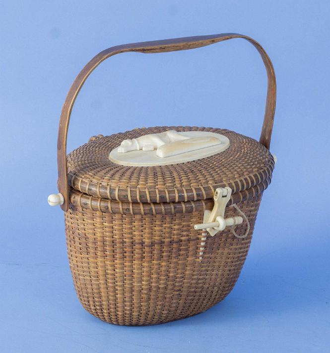 Nantucket Lightship Basked, signed and dated on bottom base "Made on Nantucket by Hose Formosoo Reyes 1970" and includes a map of Nantucket and the Original Owners Ivory Name Plate.