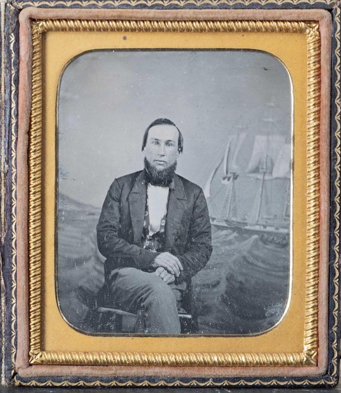 Cased 1/6 Plate Daguerreotype Of a Seated Sailor with Whaleship with Whale Boat painted Background, American circa 1850