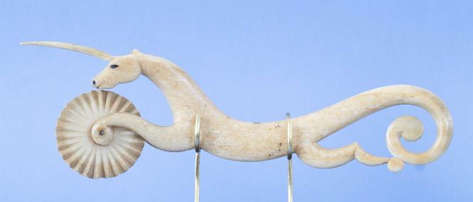 Exceptional One Piece Walrus ivory Unicorn Crimper, American, circa 1840