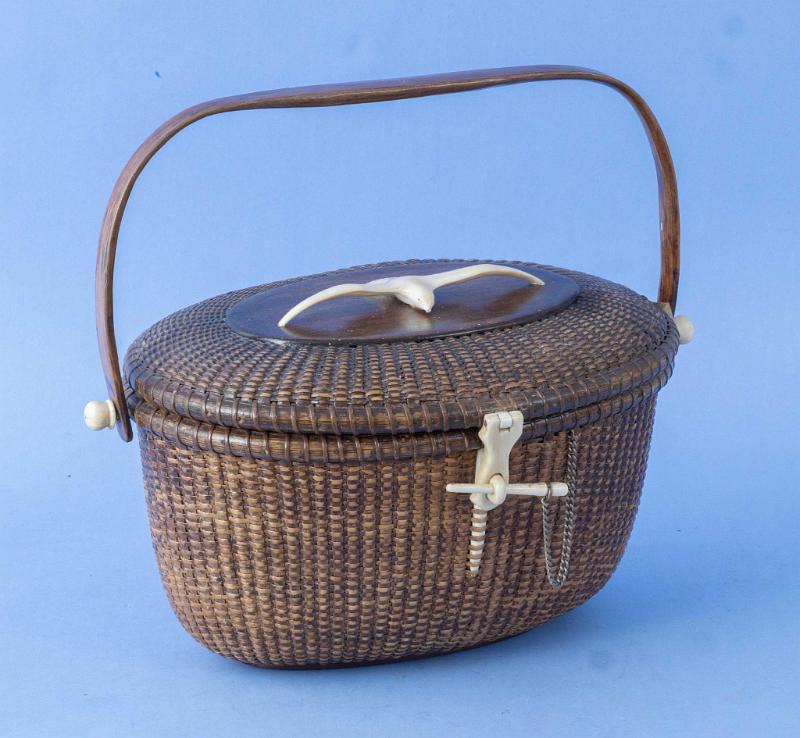 Exceptional and Large Nantucket basket with Ivory Gull on Top by Hose Fomoso Reyes